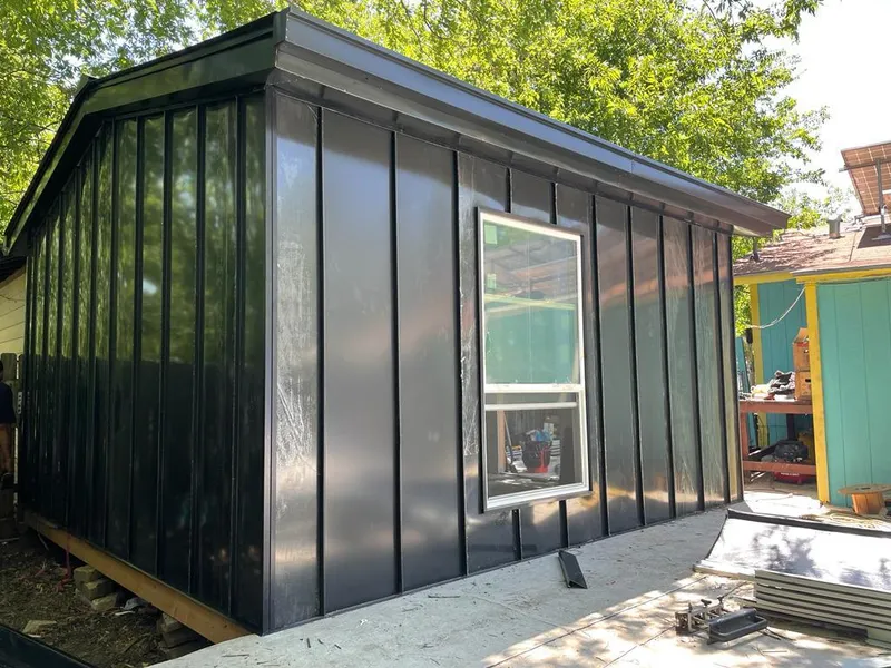 Black standing seam metal wall panels for Roof Inspection in Fair Oaks Ranch